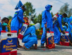 Dukung Pemerintah Cegah Corona, DPD Partai NasDem Sampang Semprot Disinfektan