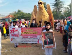 Warga Tumpah Ruah Hadiri Karnaval Desa Labuhan